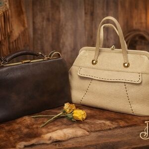 Justin  Cream Leather & Structured Satchel with Gold Accents Lot.